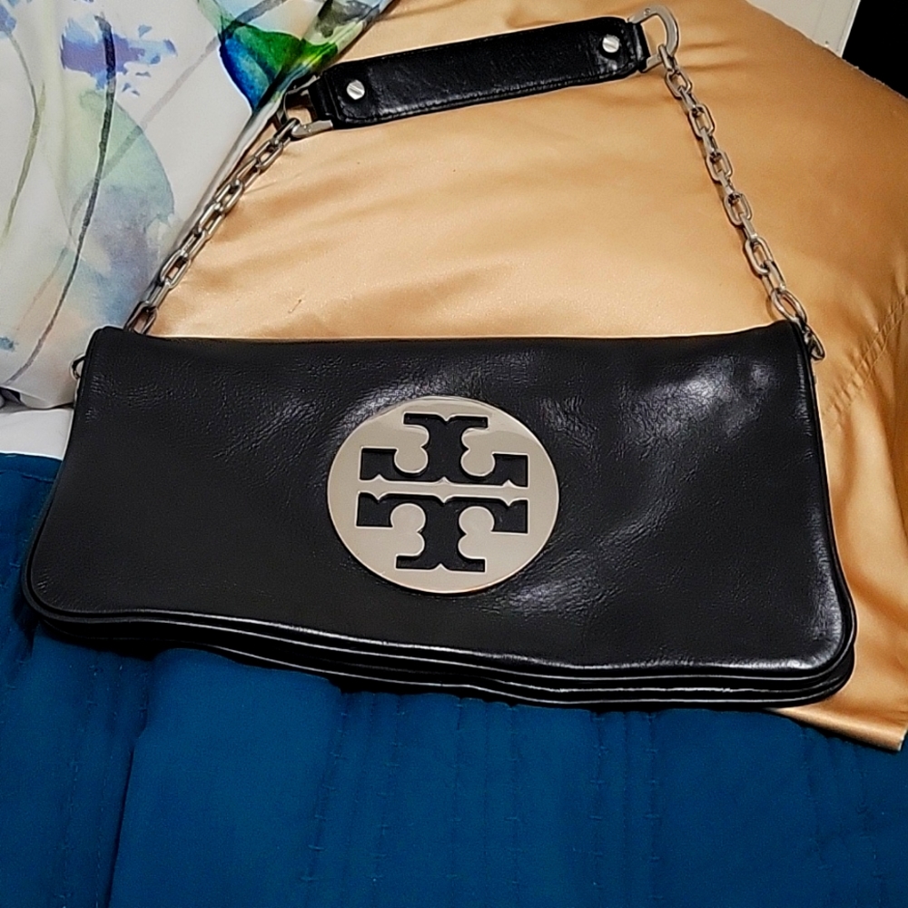 Excellent condition.Tory Burch Reva Black Leather Clutch Purse Silver Hardware